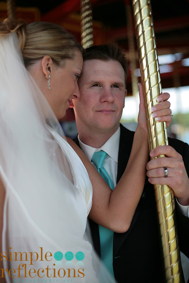 bride and groom on carousel Bozeman weddings